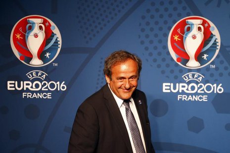 Michel Platini, UEFA President walks in front of the UEFA EURO 2016 logo at a news conference in Paris June 26, 2013. REUTERS/Charles Platia Michel Platini, UEFA President walks in front of the UEFA EURO 2016 logo at a news conference in Paris June 26, 2013. REUTERS/Charles Platia