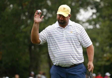 International team member Brendon de Jonge of Zimbabwe reacts after making his putt on the sixth hole while playing with teammate Ernie Els International team member Brendon de Jonge of Zimbabwe reacts after making his putt on the sixth hole while playing with teammate Ernie Els