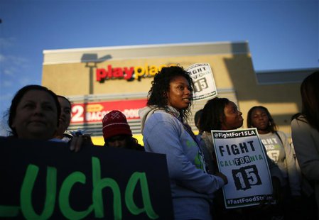 Protesters gather outside McDonald's in Los Angeles, California, December 5, 2013. REUTERS/Lucy Nicholson Protesters gather outside McDonald's in Los Angeles, California, December 5, 2013. REUTERS/Lucy Nicholson
