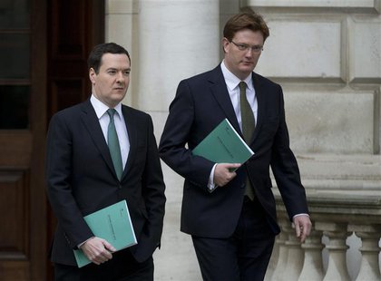 Britain's Chancellor of the Exchequer George Osborne (L), and his deputy the Chief Secretary to the Treasury Danny Alexander, leave the Trea Britain's Chancellor of the Exchequer George Osborne (L), and his deputy the Chief Secretary to the Treasury Danny Alexander, leave the Trea
