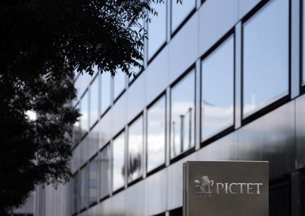 A sign bearing the logo of family owned private bank Pictet is pictured at the company headquarters in Geneva May 7, 2012. REUTERS/Denis Bal A sign bearing the logo of family owned private bank Pictet is pictured at the company headquarters in Geneva May 7, 2012. REUTERS/Denis Bal