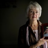 Terri Roberts, the mother of Amish school shooter Charles Roberts, holds a photograph of her son at New Covenant Community Church in Delta, Terri Roberts, the mother of Amish school shooter Charles Roberts, holds a photograph of her son at New Covenant Community Church in Delta,