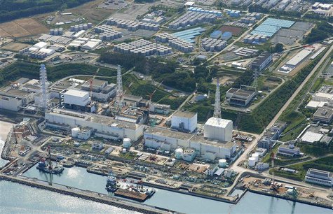 An aerial view shows the Tokyo Electric Power Co.'s (TEPCO) tsunami-crippled Fukushima Daiichi nuclear power plant and its contaminated wate An aerial view shows the Tokyo Electric Power Co.'s (TEPCO) tsunami-crippled Fukushima Daiichi nuclear power plant and its contaminated wate