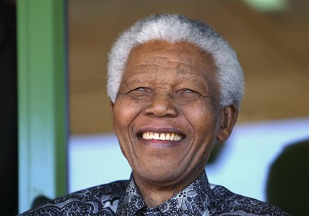 Nelson Mandela smiles as he watches the coronation ceremony of Bafokeng's King Leruo Tshekedi Molotlegi at a sports stadium in Phokeng, 120 Nelson Mandela smiles as he watches the coronation ceremony of Bafokeng's King Leruo Tshekedi Molotlegi at a sports stadium in Phokeng, 120
