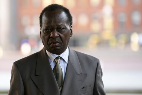 Onyango Obama, the uncle of U.S. President Barack Obama, arrives for a hearing at a federal immigration court in Boston, Massachusetts, Dece Onyango Obama, the uncle of U.S. President Barack Obama, arrives for a hearing at a federal immigration court in Boston, Massachusetts, Dece