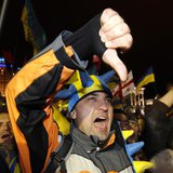 Protesters react during an opposition meeting at Independence square in Kiev, December 5, 2013. REUTERS/Vasily Fedosenko Protesters react during an opposition meeting at Independence square in Kiev, December 5, 2013. REUTERS/Vasily Fedosenko