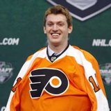 Sean Couturier puts on a Philadelphia Flyers jersey after being picked in the first round at the 2011 NHL hockey draft in St. Paul, Minnesota, June 24, 2011. REUTERS/Eric Miller Sean Couturier puts on a Philadelphia Flyers jersey after being picked in the first round at the 2011 NHL hockey draft in St. Paul, Minnesota, June 24, 2011. REUTERS/Eric Miller