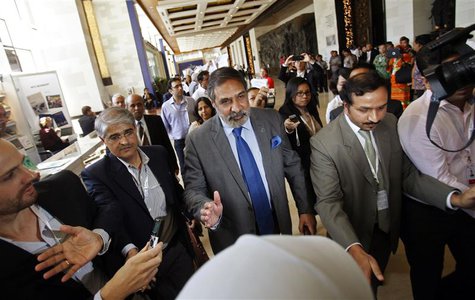 India's Commerce Minister Anand Sharma (C) arrives at the ninth World Trade Organization (WTO) Ministerial Conference in Nusa Dua, on the In India's Commerce Minister Anand Sharma (C) arrives at the ninth World Trade Organization (WTO) Ministerial Conference in Nusa Dua, on the In
