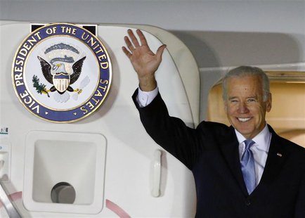 U.S. Vice President Joe Biden waves upon his arrival at Osan Air Base, south of Seoul December 5, 2013. REUTERS/Kim Hong-Ji U.S. Vice President Joe Biden waves upon his arrival at Osan Air Base, south of Seoul December 5, 2013. REUTERS/Kim Hong-Ji