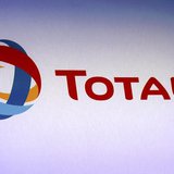 The logo of French oil company Total is pictured during the company's 2012 annual result presentation in Paris February 13, 2013. REUTERS/Ph The logo of French oil company Total is pictured during the company's 2012 annual result presentation in Paris February 13, 2013. REUTERS/Ph