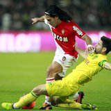 FC Nantes' Olivier Veigneau challenges AS Monaco's Radamel Falcao (L) during their French Ligue 1 soccer match at the Beaujoire in Nantes, N FC Nantes' Olivier Veigneau challenges AS Monaco's Radamel Falcao (L) during their French Ligue 1 soccer match at the Beaujoire in Nantes, N