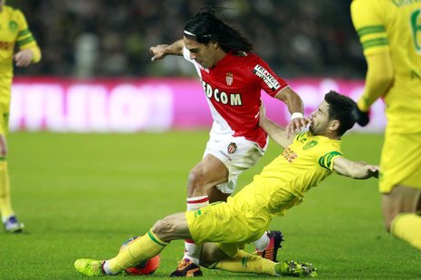 FC Nantes' Olivier Veigneau challenges AS Monaco's Radamel Falcao (L) during their French Ligue 1 soccer match at the Beaujoire in Nantes, N FC Nantes' Olivier Veigneau challenges AS Monaco's Radamel Falcao (L) during their French Ligue 1 soccer match at the Beaujoire in Nantes, N