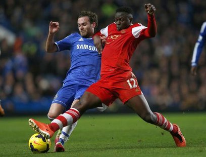 Chelsea's Juan Mata (L) challenges Southampton's Victor Wanyama during their English Premier League soccer match against Southampton at Stam Chelsea's Juan Mata (L) challenges Southampton's Victor Wanyama during their English Premier League soccer match against Southampton at Stam