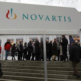 Shareholders queue to enter the St.Jakob Halle for Swiss drug maker Novartis annual general meeting in Basel February 22, 2013. REUTERS/Arnd Shareholders queue to enter the St.Jakob Halle for Swiss drug maker Novartis annual general meeting in Basel February 22, 2013. REUTERS/Arnd