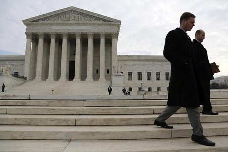 People walk outside the U.S. Supreme Court in Washington December 3, 2013. REUTERS/Jonathan Ernst People walk outside the U.S. Supreme Court in Washington December 3, 2013. REUTERS/Jonathan Ernst