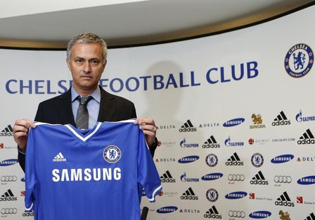 Newly reappointed Chelsea manager Jose Mourinho poses for photographers during a news conference at Stamford Bridge stadium in London June 1 Newly reappointed Chelsea manager Jose Mourinho poses for photographers during a news conference at Stamford Bridge stadium in London June 1