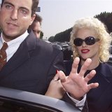 Model and former Playboy magazine Playmate Anna Nicole Smith is escorted by an unidentified attorney from her car as she arrives for opening Model and former Playboy magazine Playmate Anna Nicole Smith is escorted by an unidentified attorney from her car as she arrives for opening