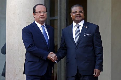 France's President Francois Hollande (L) greets Prime Minister of the Central African Republic Nicolas Tiangaye in the courtyard of the Elys France's President Francois Hollande (L) greets Prime Minister of the Central African Republic Nicolas Tiangaye in the courtyard of the Elys