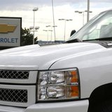 The sign at a General Motors Chevrolet dealer is seen behind a Chevrolet pickup truck in Golden, Colorado September 4, 2013. REUTERS/Rick Wi The sign at a General Motors Chevrolet dealer is seen behind a Chevrolet pickup truck in Golden, Colorado September 4, 2013. REUTERS/Rick Wi