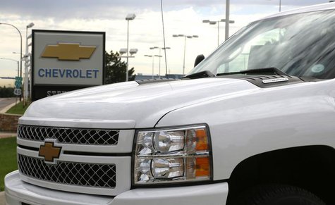 The sign at a General Motors Chevrolet dealer is seen behind a Chevrolet pickup truck in Golden, Colorado September 4, 2013. REUTERS/Rick Wi The sign at a General Motors Chevrolet dealer is seen behind a Chevrolet pickup truck in Golden, Colorado September 4, 2013. REUTERS/Rick Wi