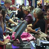 Black Friday customers make purchases at a Disney store at the Glendale Galleria in Glendale, California November 29, 2013. REUTERS/Jonathan Black Friday customers make purchases at a Disney store at the Glendale Galleria in Glendale, California November 29, 2013. REUTERS/Jonathan