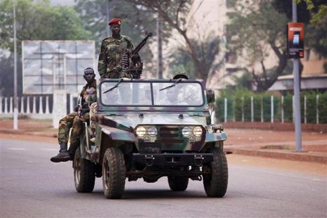 Seleka soldiers drive along a road in Bangui.
REUTERS/Emmanuel Braun Seleka soldiers drive along a road in Bangui.
REUTERS/Emmanuel Braun