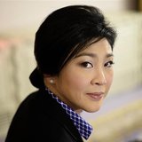 Thai Prime Minister Yingluck Shinawatra poses for a picture during an interview with foreign media at the Government House in Bangkok Decemb Thai Prime Minister Yingluck Shinawatra poses for a picture during an interview with foreign media at the Government House in Bangkok Decemb