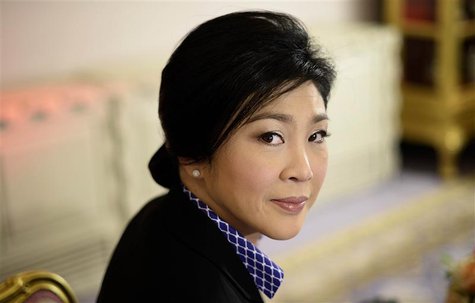 Thai Prime Minister Yingluck Shinawatra poses for a picture during an interview with foreign media at the Government House in Bangkok Decemb Thai Prime Minister Yingluck Shinawatra poses for a picture during an interview with foreign media at the Government House in Bangkok Decemb