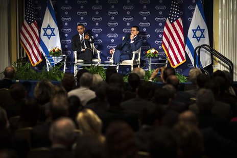U.S. President Barack Obama (L) speaks with Israeli-American media tycoon Haim Saban in front of a live audience about negotiations with Ira U.S. President Barack Obama (L) speaks with Israeli-American media tycoon Haim Saban in front of a live audience about negotiations with Ira