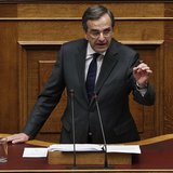 Greece's Prime Minister Antonis Samaras delivers a speech during a parliament session where lawmakers vote on the 2014 budget in Athens Dece Greece's Prime Minister Antonis Samaras delivers a speech during a parliament session where lawmakers vote on the 2014 budget in Athens Dece