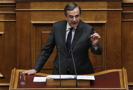 Greece's Prime Minister Antonis Samaras delivers a speech during a parliament session where lawmakers vote on the 2014 budget in Athens Dece Greece's Prime Minister Antonis Samaras delivers a speech during a parliament session where lawmakers vote on the 2014 budget in Athens Dece