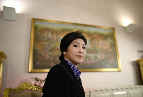Thai Prime Minister Yingluck Shinawatra poses for a picture during an interview with foreign media at the Government House in Bangkok Decemb Thai Prime Minister Yingluck Shinawatra poses for a picture during an interview with foreign media at the Government House in Bangkok Decemb