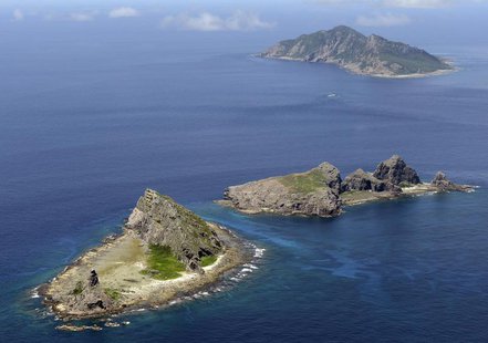 A group of disputed islands, Uotsuri island (top), Minamikojima (bottom) and Kitakojima, known as Senkaku in Japan and Diaoyu in China is se A group of disputed islands, Uotsuri island (top), Minamikojima (bottom) and Kitakojima, known as Senkaku in Japan and Diaoyu in China is se