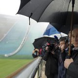 Russia's President Vladimir Putin (front) visits the "RusSki Gorki" Jumping Center at the Krasnaya Polyana resort near the Black Sea city of Russia's President Vladimir Putin (front) visits the "RusSki Gorki" Jumping Center at the Krasnaya Polyana resort near the Black Sea city of