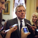 U.S. Senator Richard Durbin (D-IL) talks with reporters near the U.S. Senate floor at the U.S. Capitol during immigration debates in Washing U.S. Senator Richard Durbin (D-IL) talks with reporters near the U.S. Senate floor at the U.S. Capitol during immigration debates in Washing