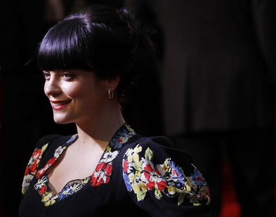 British singer Lily Allen poses as she arrives for the British premiere of Tamara Drew in Leicester Square, central London September 6, 2010 British singer Lily Allen poses as she arrives for the British premiere of Tamara Drew in Leicester Square, central London September 6, 2010
