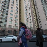 A student walks along a street next to a school-area neighbourhood in Beijing, December 6, 2013. REUTERS/Iris Zhao A student walks along a street next to a school-area neighbourhood in Beijing, December 6, 2013. REUTERS/Iris Zhao