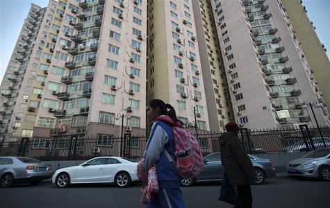 A student walks along a street next to a school-area neighbourhood in Beijing, December 6, 2013. REUTERS/Iris Zhao A student walks along a street next to a school-area neighbourhood in Beijing, December 6, 2013. REUTERS/Iris Zhao