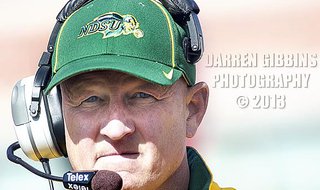 NDSU head coach Craig Bohl walking the sidelines during the 2013 college football season. NDSU head coach Craig Bohl walking the sidelines during the 2013 college football season.