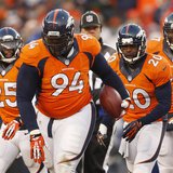Dec 8, 2013; Denver, CO, USA; Denver Broncos defensive tackle Terrance Knighton (94) after catching an interception during the second half a Dec 8, 2013; Denver, CO, USA; Denver Broncos defensive tackle Terrance Knighton (94) after catching an interception during the second half a