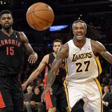 Dec 8, 2013; Los Angeles, CA, USA; Los Angeles Lakers center Jordan Hill (27) and Toronto Raptors power forward Amir Johnson (15) watch as t Dec 8, 2013; Los Angeles, CA, USA; Los Angeles Lakers center Jordan Hill (27) and Toronto Raptors power forward Amir Johnson (15) watch as t