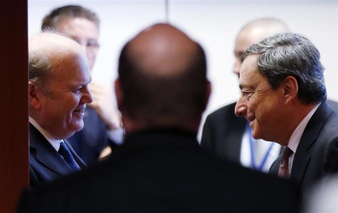Ireland's Finance Minister Michael Noonan talks to European Central Bank (ECB) President Mario Draghi (R) during an eurozone finance ministe Ireland's Finance Minister Michael Noonan talks to European Central Bank (ECB) President Mario Draghi (R) during an eurozone finance ministe