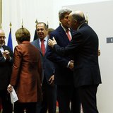 Iranian Foreign Minister Mohammad Javad Zarif (2nd L) talks with European Union foreign policy chief Catherine Ashton (3rd L) next to Britis Iranian Foreign Minister Mohammad Javad Zarif (2nd L) talks with European Union foreign policy chief Catherine Ashton (3rd L) next to Britis