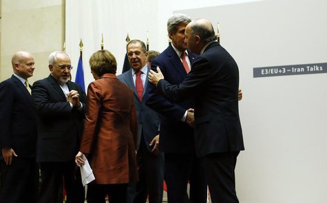 Iranian Foreign Minister Mohammad Javad Zarif (2nd L) talks with European Union foreign policy chief Catherine Ashton (3rd L) next to Britis Iranian Foreign Minister Mohammad Javad Zarif (2nd L) talks with European Union foreign policy chief Catherine Ashton (3rd L) next to Britis