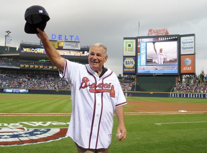 Former Atlanta Braves manager Bobby Cox waves to the crowd after throwing out the first pitch at the start of their home opening MLB Nationa Former Atlanta Braves manager Bobby Cox waves to the crowd after throwing out the first pitch at the start of their home opening MLB Nationa