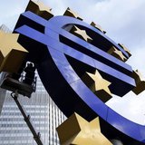 Workers maintain the huge Euro logo in front of the headquarters of the European Central Bank (ECB) in Frankfurt, December 6, 2011. REUTERS/ Workers maintain the huge Euro logo in front of the headquarters of the European Central Bank (ECB) in Frankfurt, December 6, 2011. REUTERS/