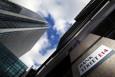 A sign for Bank Street and high rise offices are pictured in the financial district Canary Wharf in London in this October 21, 2010 file pho A sign for Bank Street and high rise offices are pictured in the financial district Canary Wharf in London in this October 21, 2010 file pho