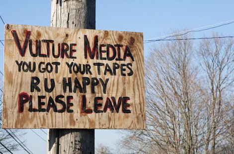 A sign expressing displeasure with the media is tacked on a pole in Newtown, Connecticut December 4, 2013. REUTERS/Michelle McLoughlin A sign expressing displeasure with the media is tacked on a pole in Newtown, Connecticut December 4, 2013. REUTERS/Michelle McLoughlin