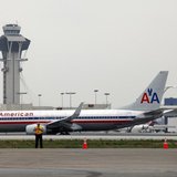An American Airlines jet passes the Air Traffic Control Tower on the runway at Los Angeles International Airport (LAX), California April 24, An American Airlines jet passes the Air Traffic Control Tower on the runway at Los Angeles International Airport (LAX), California April 24,