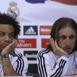 Real Madrid's Marcelo (L) and Luka Modric attend a news conference to discuss the draw for the 2014 World Cup at the Valdebebas training gro Real Madrid's Marcelo (L) and Luka Modric attend a news conference to discuss the draw for the 2014 World Cup at the Valdebebas training gro